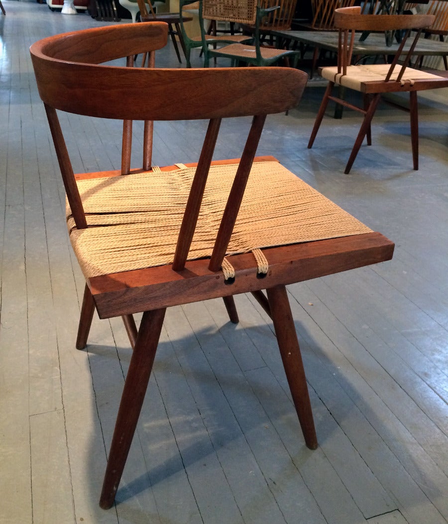 Set of Four Walnut and Woven Seat Chairs by George Nakashima 3