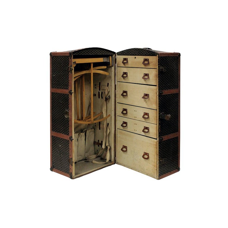 A large and impressive E. Goyard steamer trunk, Paris, France circa 1900. It features a dome shaped trunk case covered with Goyard signature chevron canvas and befitted with patinated locks. The steamer trunk opens to the original fitted interior