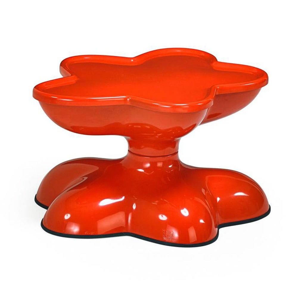 A rare orange color swivel coffee table from the Molar Group manufactured by Beylerian, circa 1969. The table is one of the only designs in the molar group that is adjustable by swivel. Made of orange gel-coated fiberglass, it still retains very