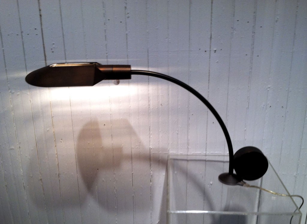 Bronze Omaha Counter balance desk lamp by Cedric Hartman. Swivel base and shade. Lucite dimmer control. All original finish. Stunning piece.
Please call the gallery to make sure this item is on display before visiting.