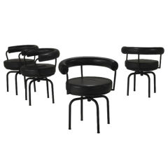 Four vintage LC7 chairs Le Corbusier