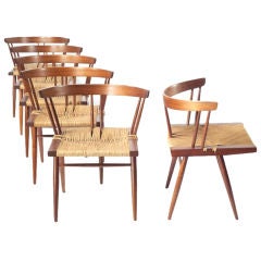 On hold Six walnut and grass chairs George Nakashima