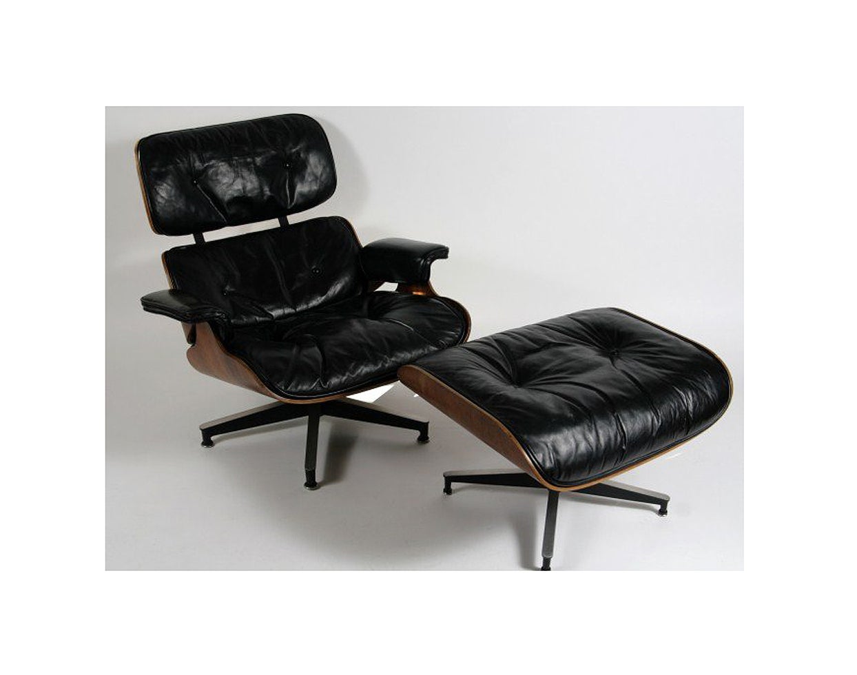 Early Charles Eames Rosewood lounge chair and ottoman