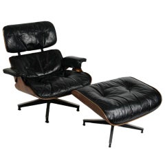 Early Charles Eames Rosewood lounge chair and ottoman