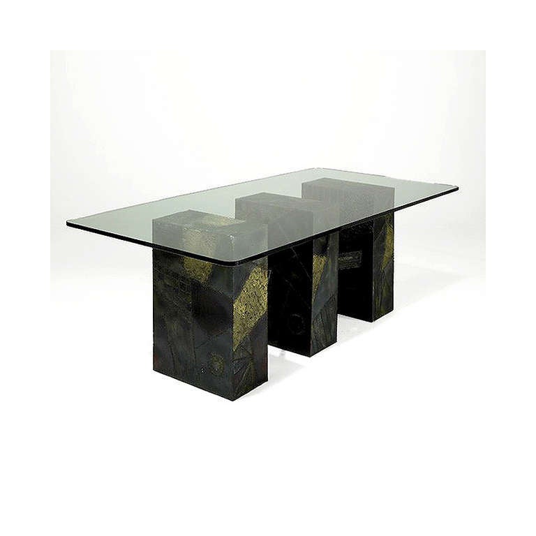 A rare dining table in the sculpted bronze series by Paul Evans for Directional. Studio crafted in New Hope, PA, circa 1970s. Paul Evans was known for crafting fine furniture by using welding techniques and different types of metal for construction