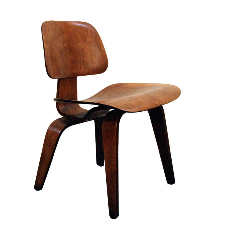 Early walnut Charles Eames DCW Chair by Evans