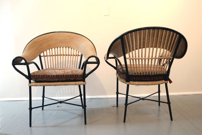 Designed as part of Budji Collection by Filipino Antonio Layug, these chairs were constructed with heavy cast iron and bent bamboo. Custom-made cushions with a touch of Asian resort. Very heavy and solid with beautiful presence.<br />
<br />
This