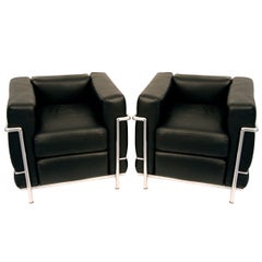 On hold Pair of Black Leather LC-2 Chairs by Le Corbusier