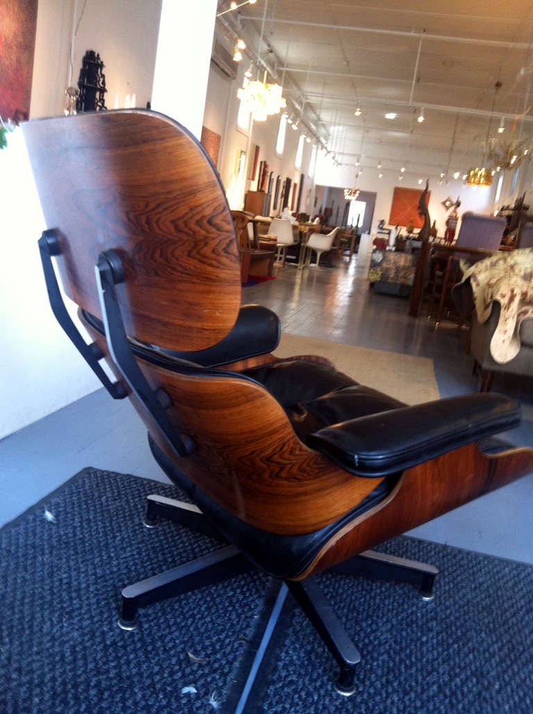 Mid-20th Century Early Charles Eames Rosewood lounge chair and ottoman