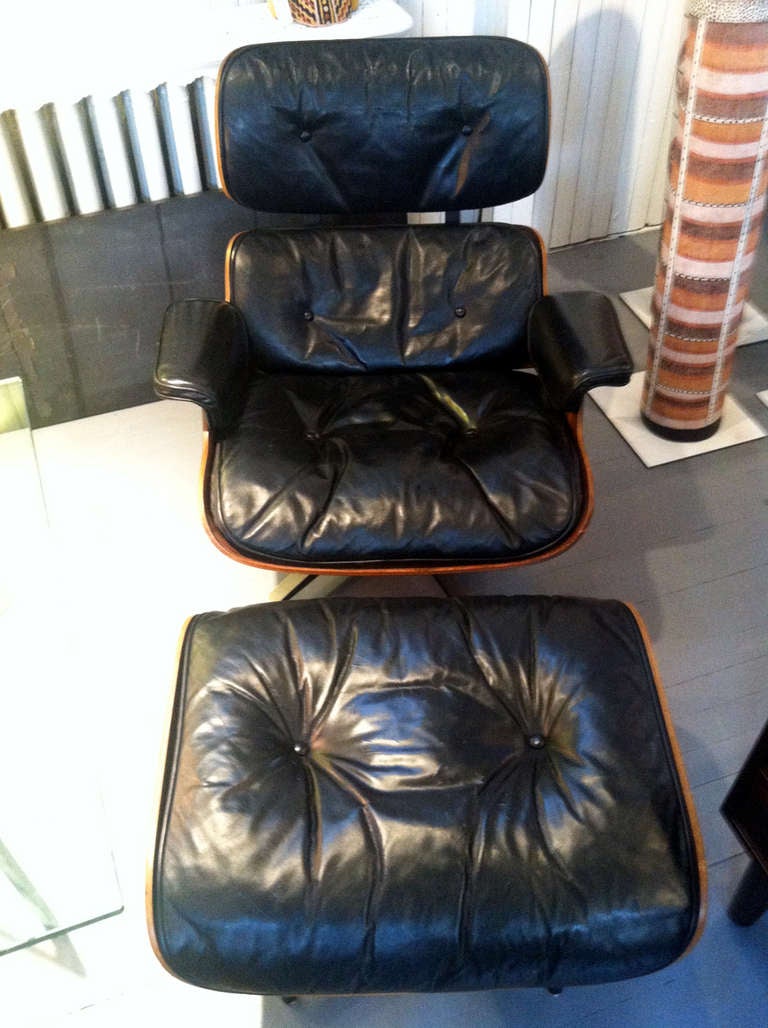 Early Charles Eames Rosewood lounge chair and ottoman 4