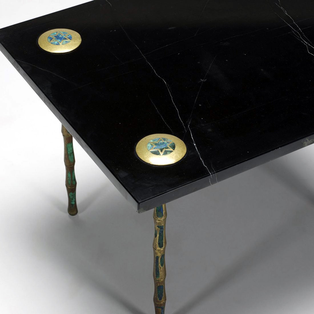 An unusual table crafted by Mexican artist Pepe Mendoza, circa 1965. Mendoza normally worked on smaller scale to produce metal works with ceramic inlay as lamps and furniture accessories, so it is rare to see a larger piece like this. A signature