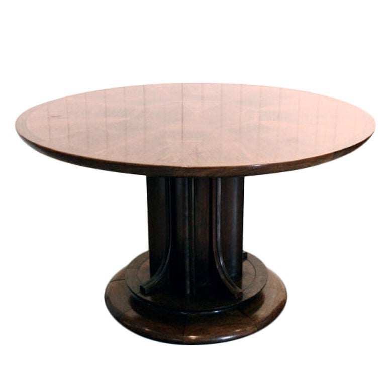 Round pedestal table constructed in oak with marquetry top. High art deco period piece and Dutch origin.