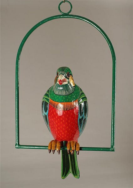 Beautiful parrot sculptor on a hanger by Mexican artist Sergio Bustamante, circa 1970s. Constructed with Papier Mache and brilliantly painted in bright colors. Signed and numbered.