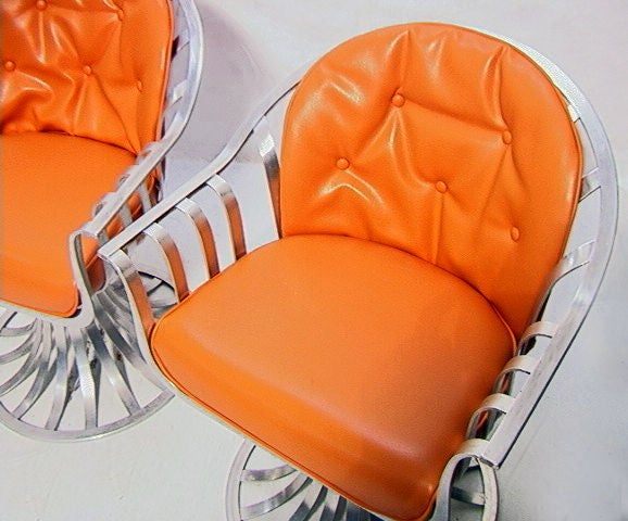 Aluminum Four Russell Woodard aluminum swivel chairs