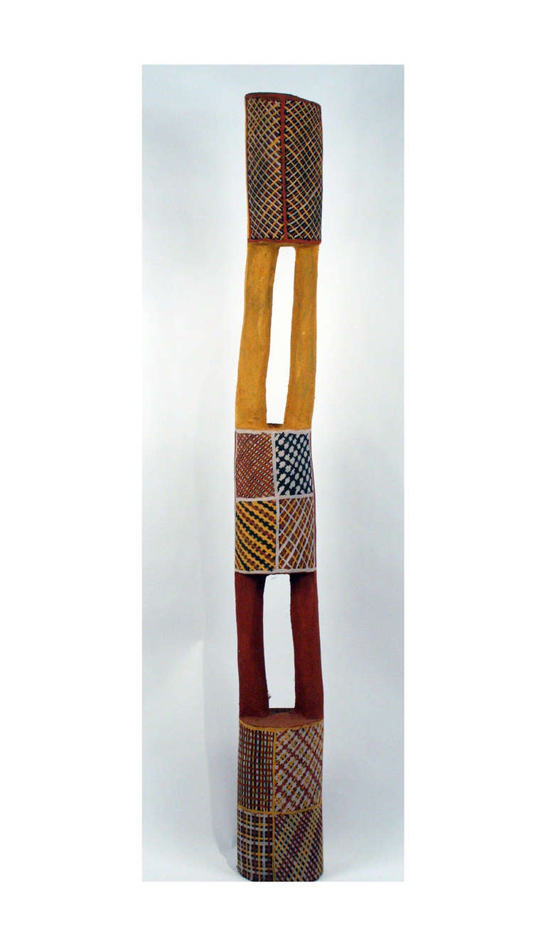 Pukumoni Pole is a clan totem pole from Tiwi Island off the northern Australian coast. It is made of the dense iron wood and decorated with clan specific symbols using ochre pigment. Historically these poles were left outdoors for ceremonial