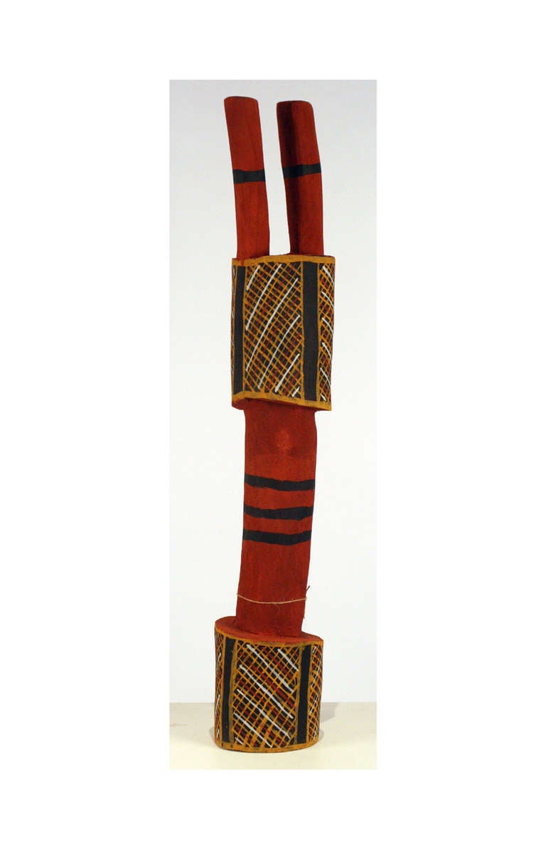Pukumoni Pole is a clan totem pole from Tiwi Island off the northern Australian coast. It is made of the dense iron wood and decorated with clan specific symbols using ochre pigment. Historically these poles were left outdoors for ceremonial