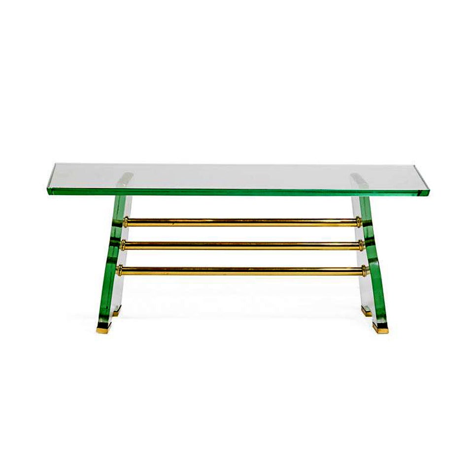 Italian glass coffee table in the style of Pietra Chiesa for Fontana Arte. The stunning glass table is constructed with heavy glass with green tint and beveled edges. It features brass hardware including three connecting stretcher bars and brass