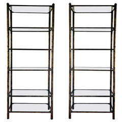 Pair Hollywood Regency shelves etagere patinated metal and glass