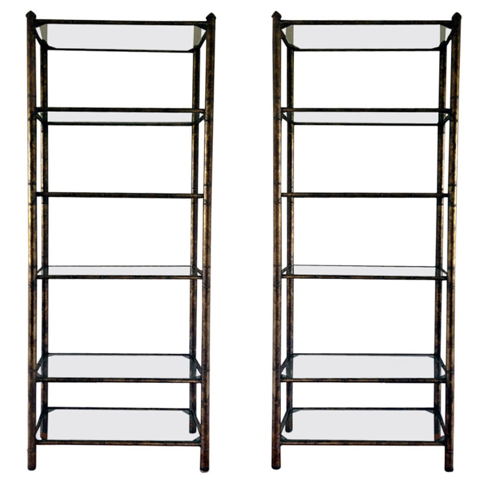 Pair Hollywood Regency shelves etagere patinated metal and glass