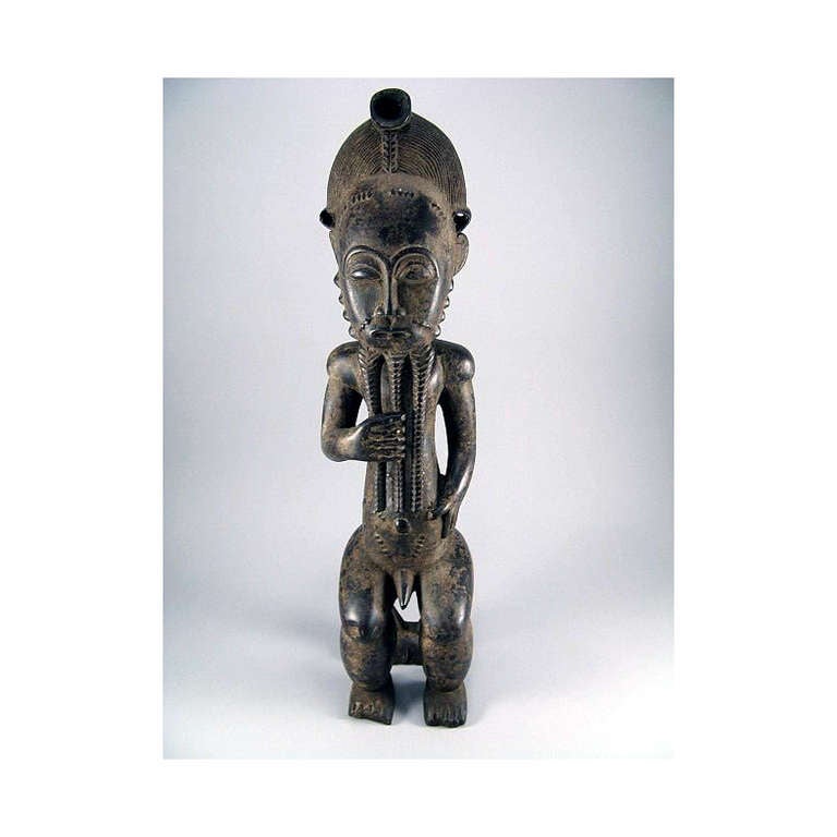 One of the three groups of statues created by Baule people in central Ivory Coast, Asie Usu (Spirit of Nature) represents a male spirit who possesses unpredictable persona and power. These creatures are able to morph into different forms and can be