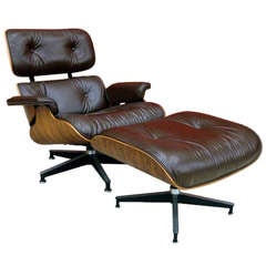 Rosewood brown leather lounge chair and ottoman Charles Eamess B