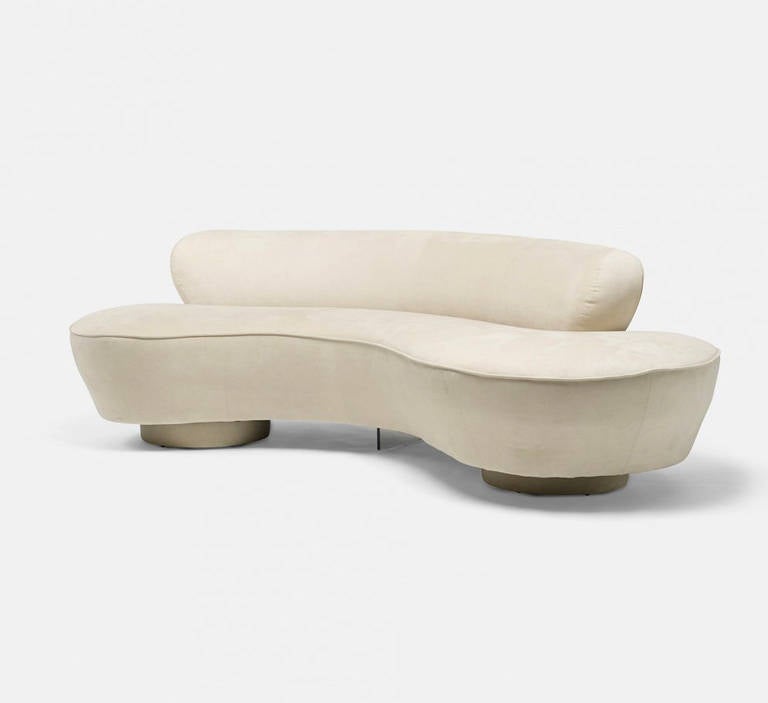 A beautiful serpentine sofa designed by Vladimir Kagan in 1950s and made by Directional, USA, circa 1990s. It is one of the most iconic design by Kagan emphasizing the both sculptural organic form and user's comfort. Sometimes referred as Cloud