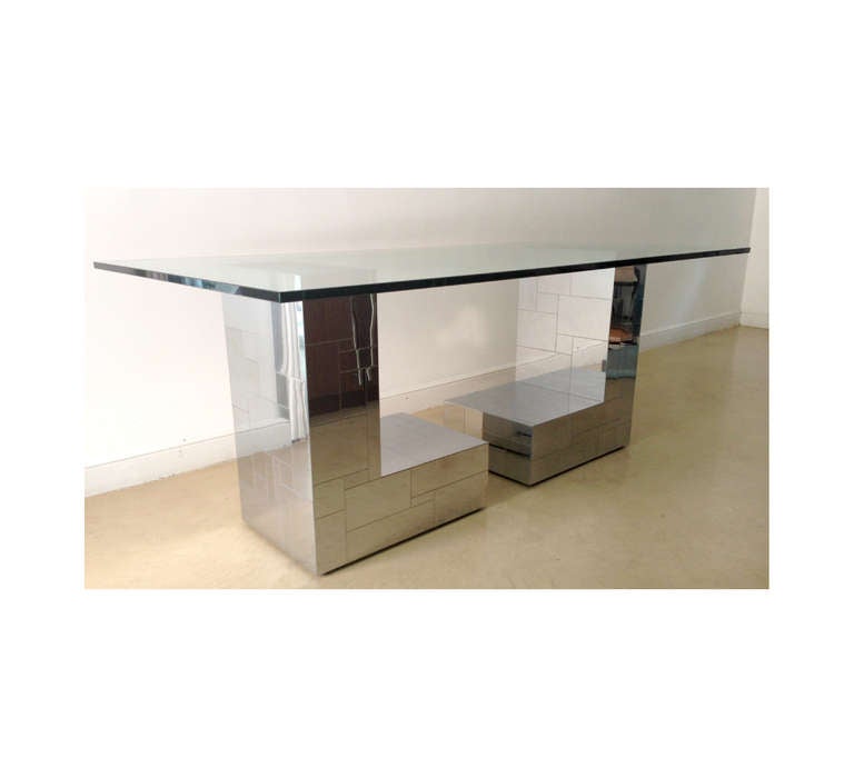 The two L shape pedestals was designed by Paul Evans circa 1970s for Directional as table bases. They are clad in chrome patchwork veneer and signed as 