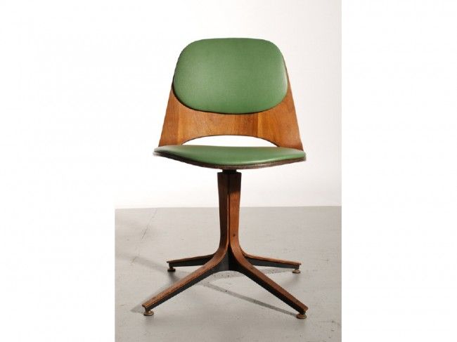 Beautiful Swivel chair made by Plycraft. Original green vinyl seat pads on seat and back support. Original Plycraft sticker dated to Nov 1, 1963.<br />
<br />
This item is located at Tishu Hudson.