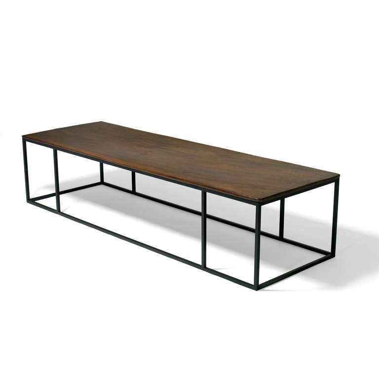 Atelier Demiurge collection: The Netherlandish coffee table. The antique walnut top above a hand forged rectilinear iron base. Custom sizes available.