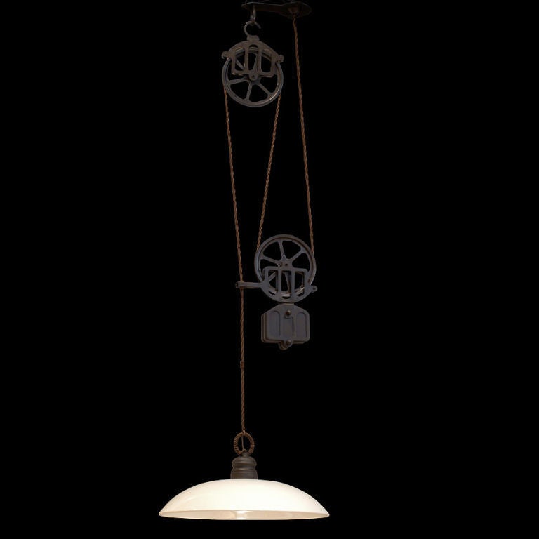 Double pulley ceiling fixture with porcelain shade.
