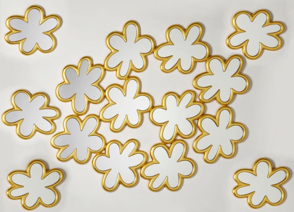 Connected flower shaped mirrors with satellite flower mirrors. 
Available with yellow gold leaf or white gold leaf.

Limited edition of 25.
Signed.

Hubert Le Gall's work is a bold combination of sophisticated and playful. Inspired by the