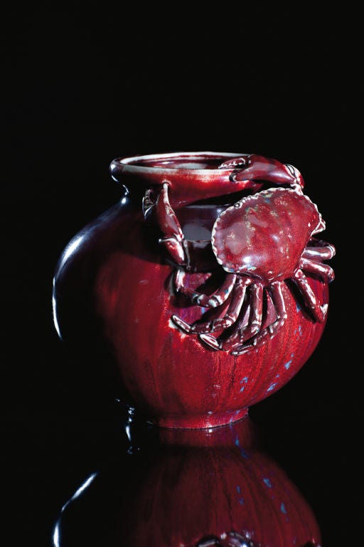 Imminent danger seems to be the theme of this exciting blood-red vase. The realistic rendering of the creeping crab simultaneously suggests the work of sixteenth-century French ceramist Bernard Palissy, lively drawings taken from Japanese