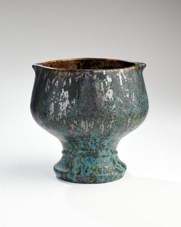 The perfect balance of malachite and verdant blue glazes gives this vase the appearance of sunken treasure. This form is somehow stately while being fun and adventurous. Marks: Stamped with Dalpayrat grenade.