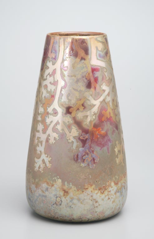 With a decor of glittering Mediterranean coral, this vase, perhaps more than any other, evokes the sea around Algeria, the homeland of Clément Massier's art director Lucien Lévy-Dhurmer. Using their signature technique of luster glazing combined