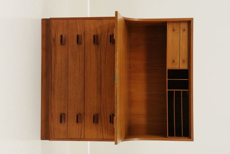Drop front secretary desk designed by Borge Mogensen and produced by FDB out of Denmark in the mid 50's. Function and eye pleasing aesthtic embody this simple, straightforward desk by Borge Mogensen. Clean original condition.