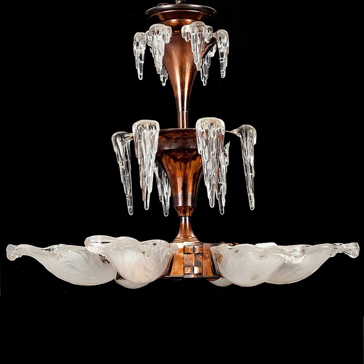 Designer: Jean Boris Lacroix (French, 1902–84)

A French Art Deco copper and cast frosted glass chandelier in the form of a frozen fountain. It is the best example we have ever found in this style with a lovely patina. Shade signed: LA with a