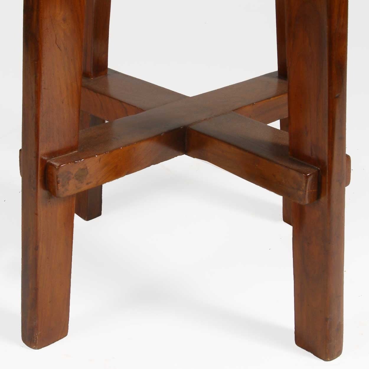 (Swiss, 1896-1967).
Crafted of solid teak with a round caned seat supported on four tapered legs joined by an X-stretcher.

Literature: E. Touchaleaume and G. Moreau, Le Corbusier and Pierre Jeanneret: The Indian Adventure,