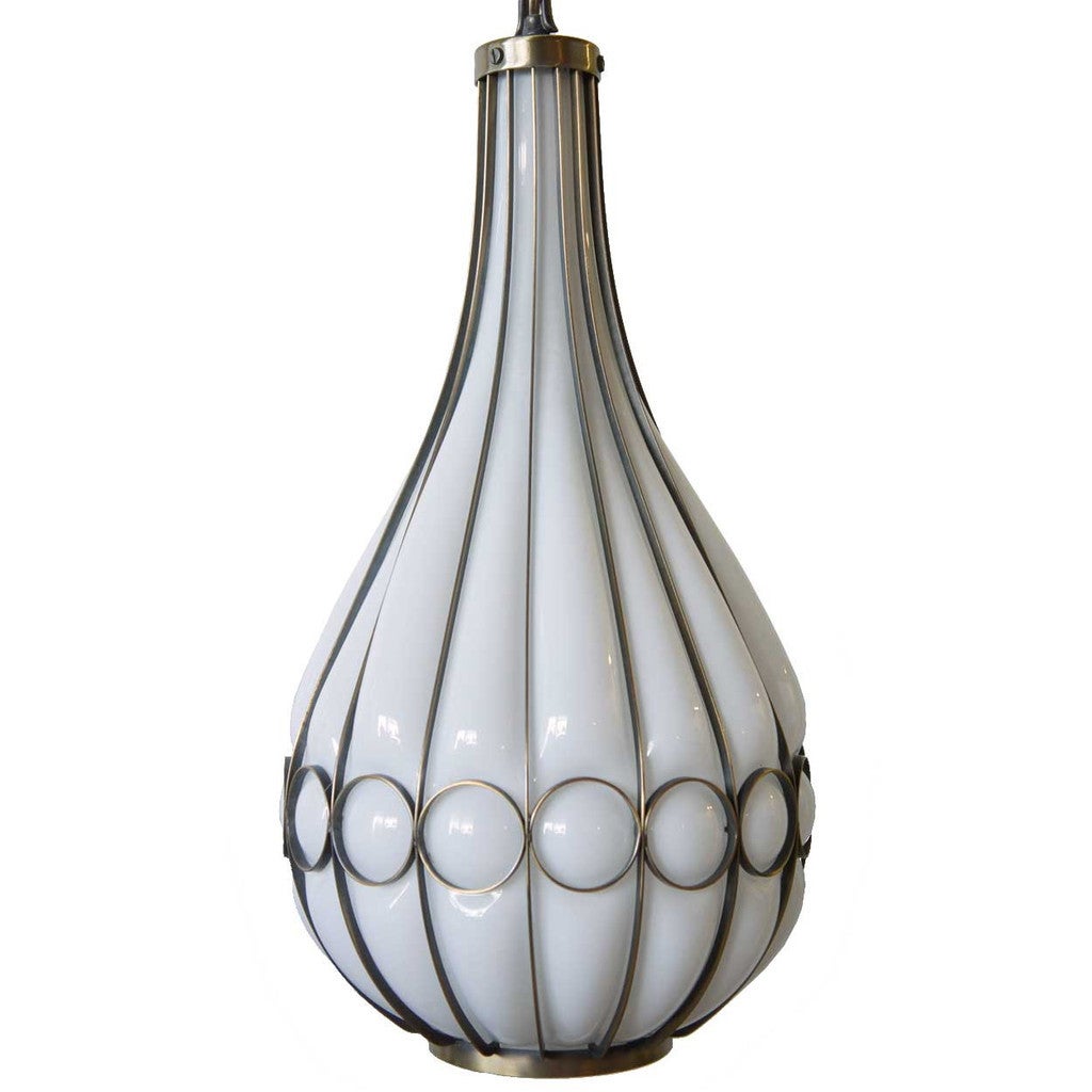 A pair of very striking, vintage caged brass and white glass onion-shape hanging lights.