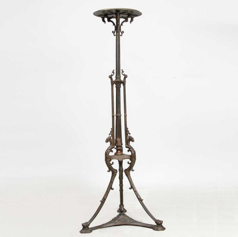 Foundry: Ernst Georg Zimmermann (Hanau, Germany, founded c. 1840)<br />
Foundry mark and numbered 12877. Retaining the original, well-patinated finish, this pretty, delicate plant stant features feathering on the small, round top. The pedestal stem