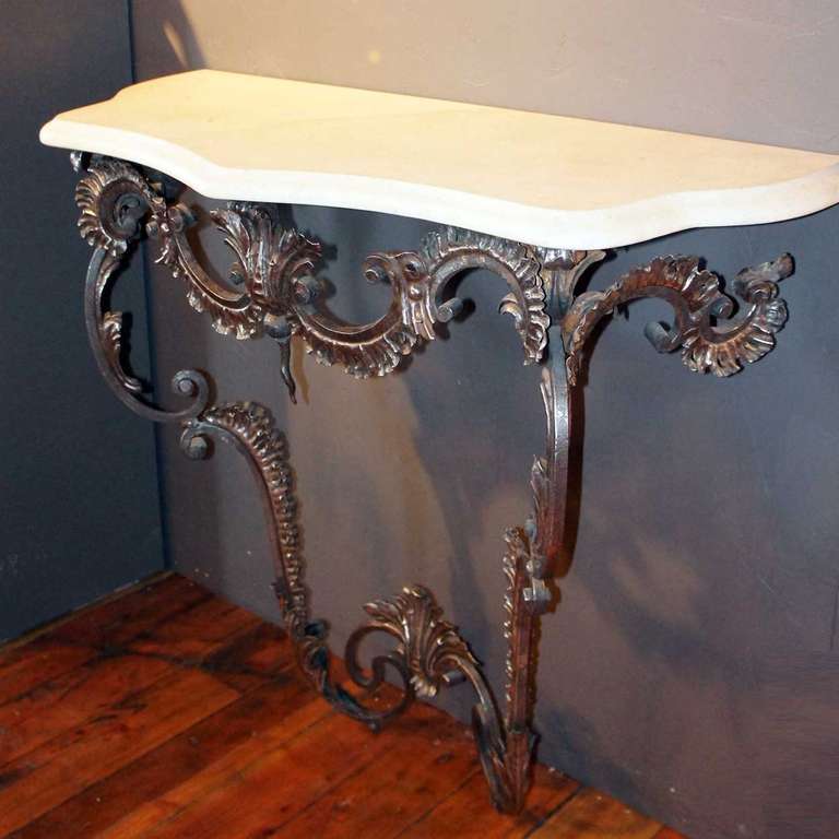 Pair of Italian Rococo Style Polished Steel Limestone Top Consoles In Good Condition For Sale In Denver, CO