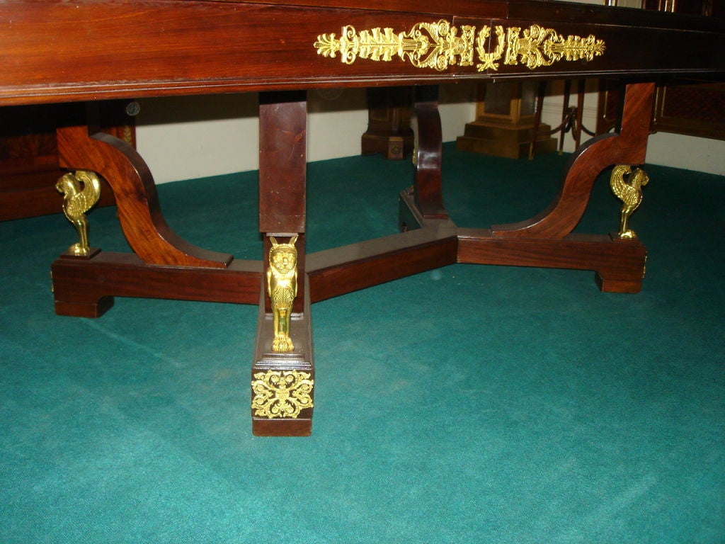 Gilt An Important late 19th century gilt bronze-mounted Empire style dining table