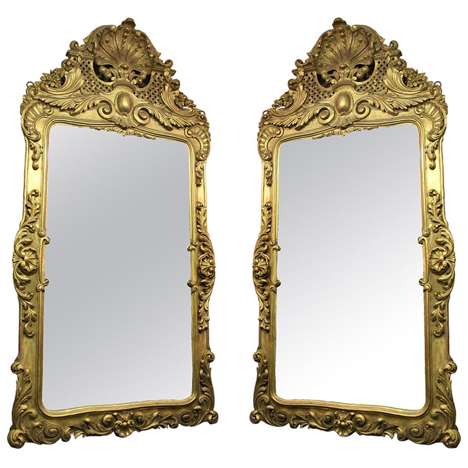 Pair of Large and Great Quality Late 19th Century Hand-Carved Giltwood Mirrors