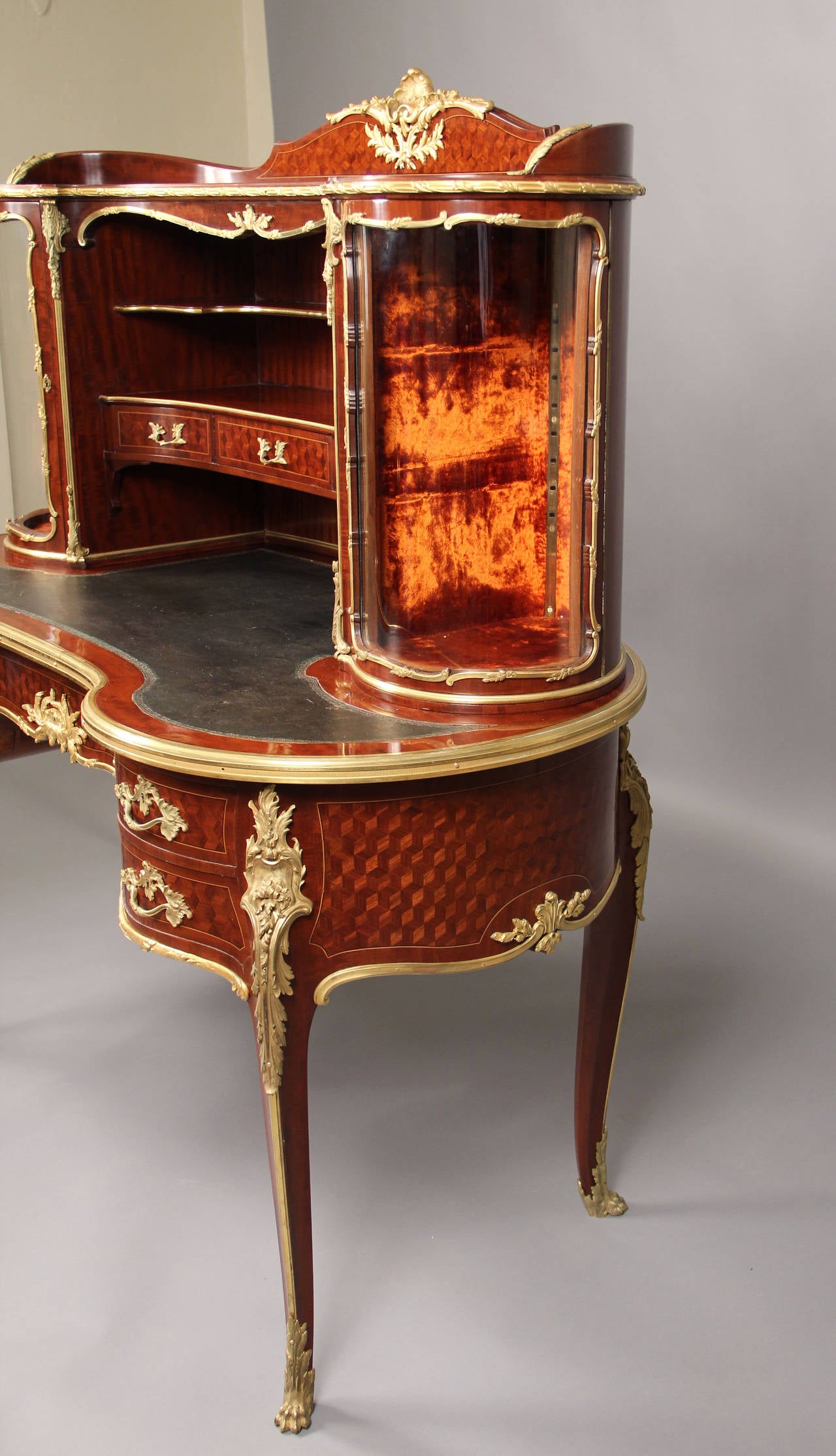 A rare and very special late 19th century Louis XV style gilt bronze-mounted two-tier kidney shaped bureau

by Franc¸ois Linke.

The upper case with shaped top, surmounted by a serpentine three quarter gallery centered by a rocaille cresting