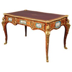 Late 19th Century Gilt Bronze and Sèvres Style Plaque Mounted Leather Top Desk