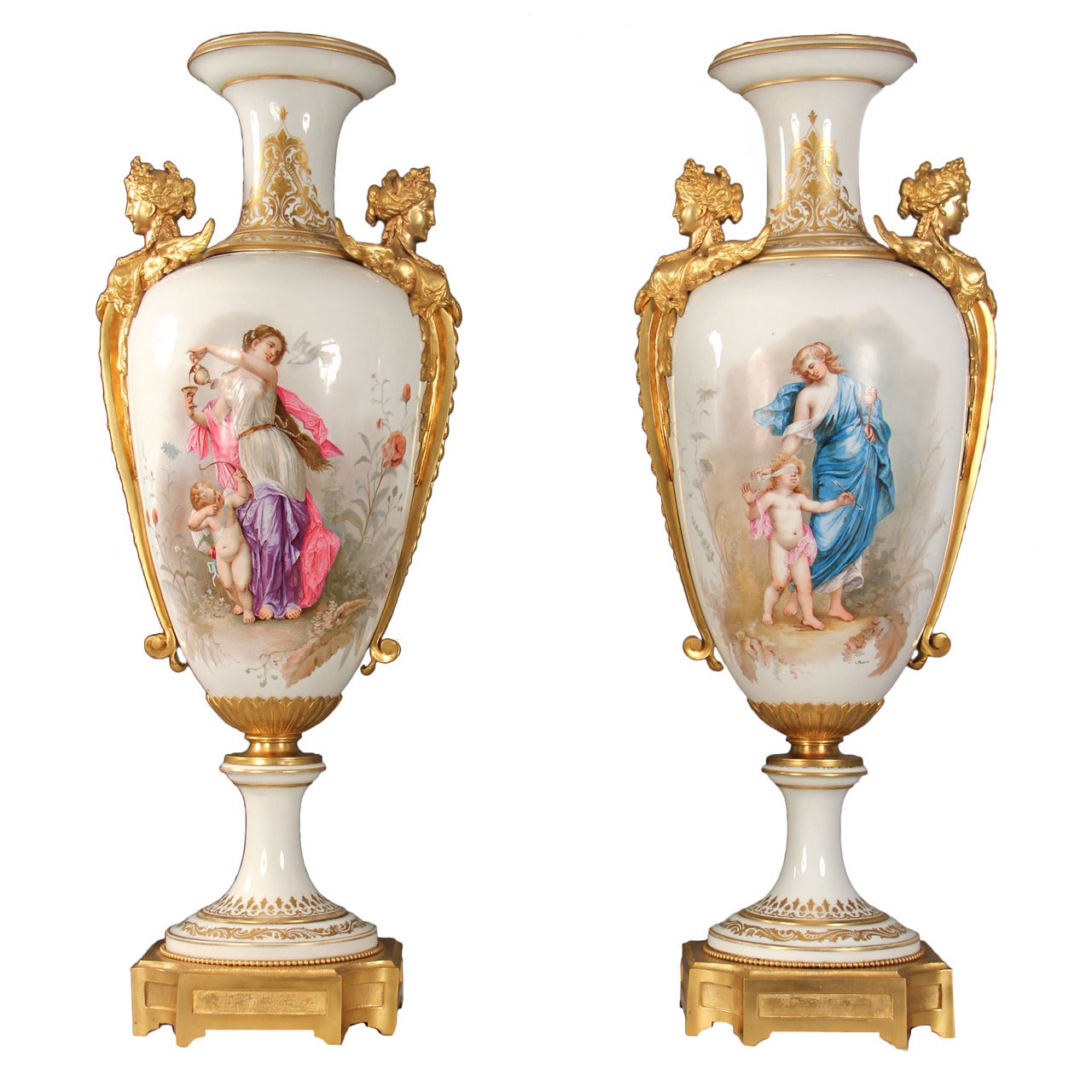 A Rare Pair of Late 19th Century Gilt Bronze Mounted White Sèvres Style Vases