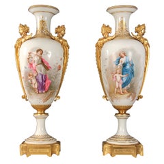 Used A Rare Pair of Late 19th Century Gilt Bronze Mounted White Sèvres Style Vases