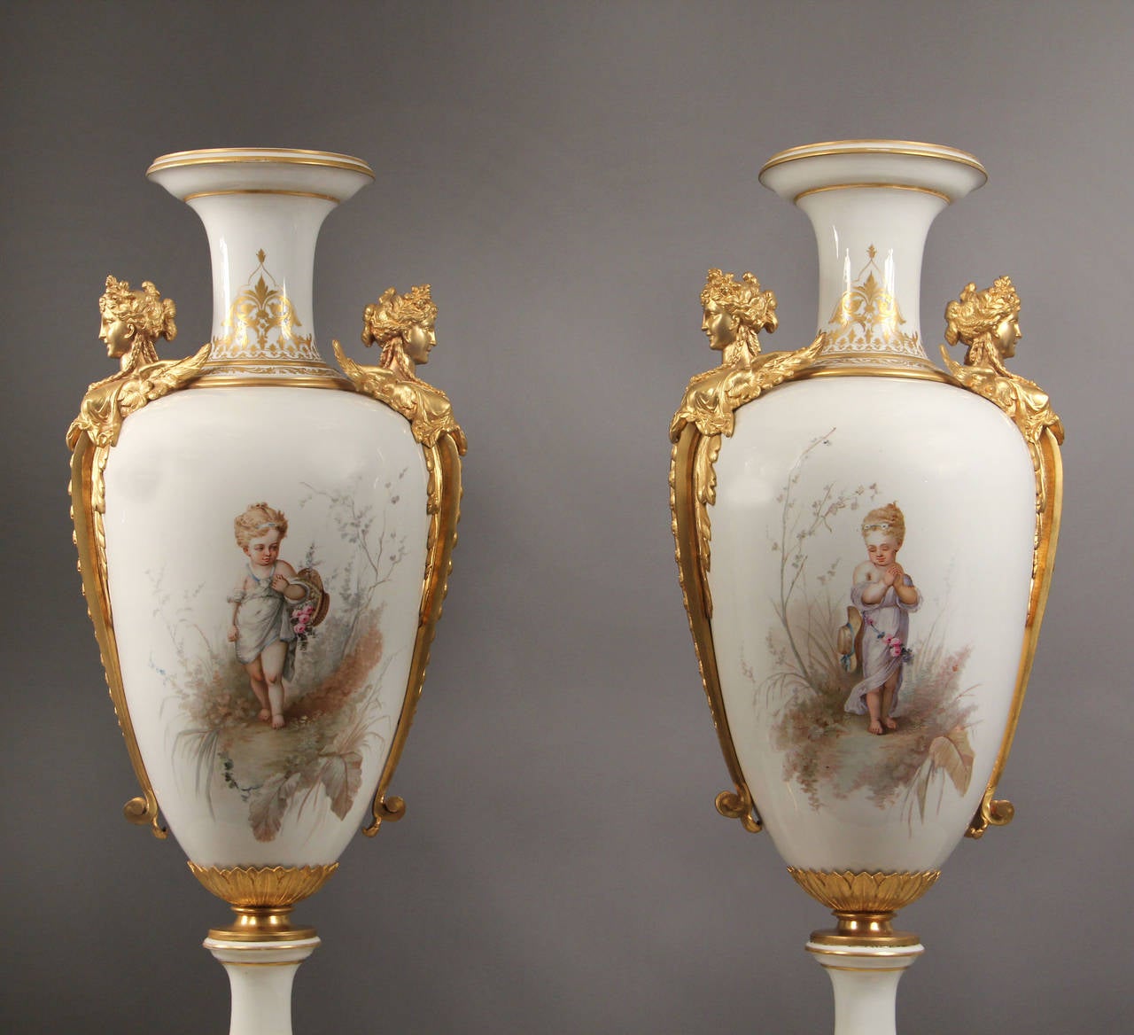 Belle Époque A Rare Pair of Late 19th Century Gilt Bronze Mounted White Sèvres Style Vases
