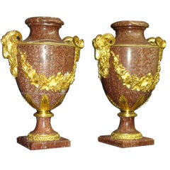 A large and impressive pair of late 19th century gilt bronze mounted Urns 12