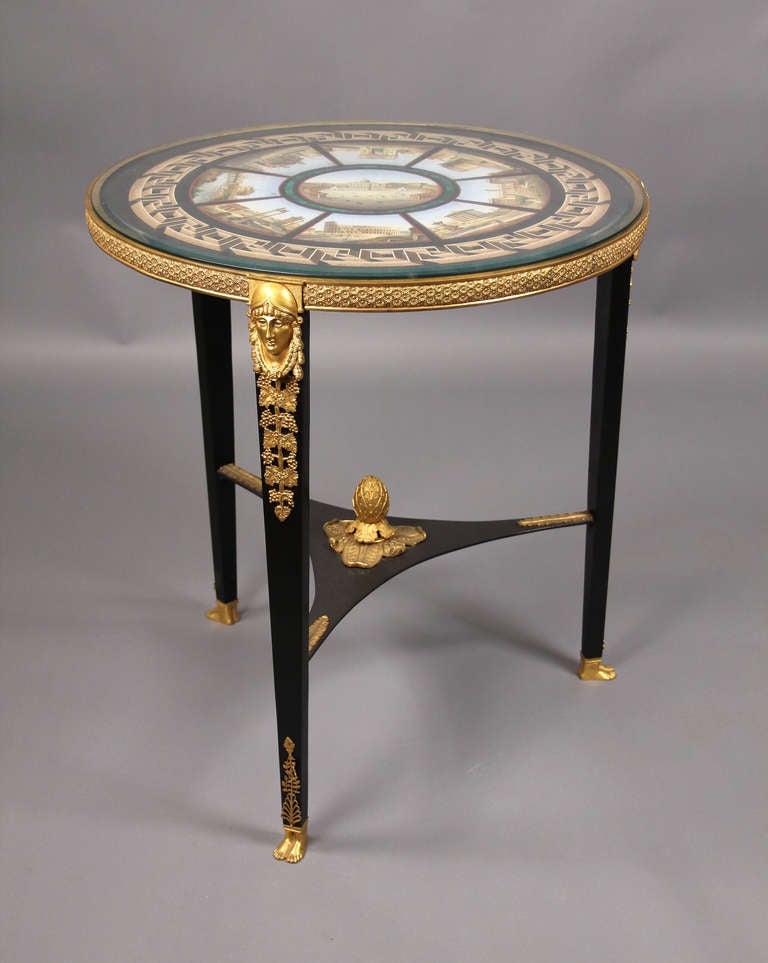 Late 19th century gilt bronze-mounted Italian Micromosaic table.

With a view of St. Peter's square in the center within a Band of Malachite. Surrounded by eight further views of Rome: The Tomb of Cecilia Matella, Capitoline Hill, the Temple of