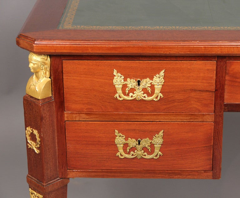 Late 19th Century Gilt Bronze Mounted Empire Style Desk

A leather top above five bronze mounted drawers, typical empire style bronze mounts on tapering legs, leading to paw feet.